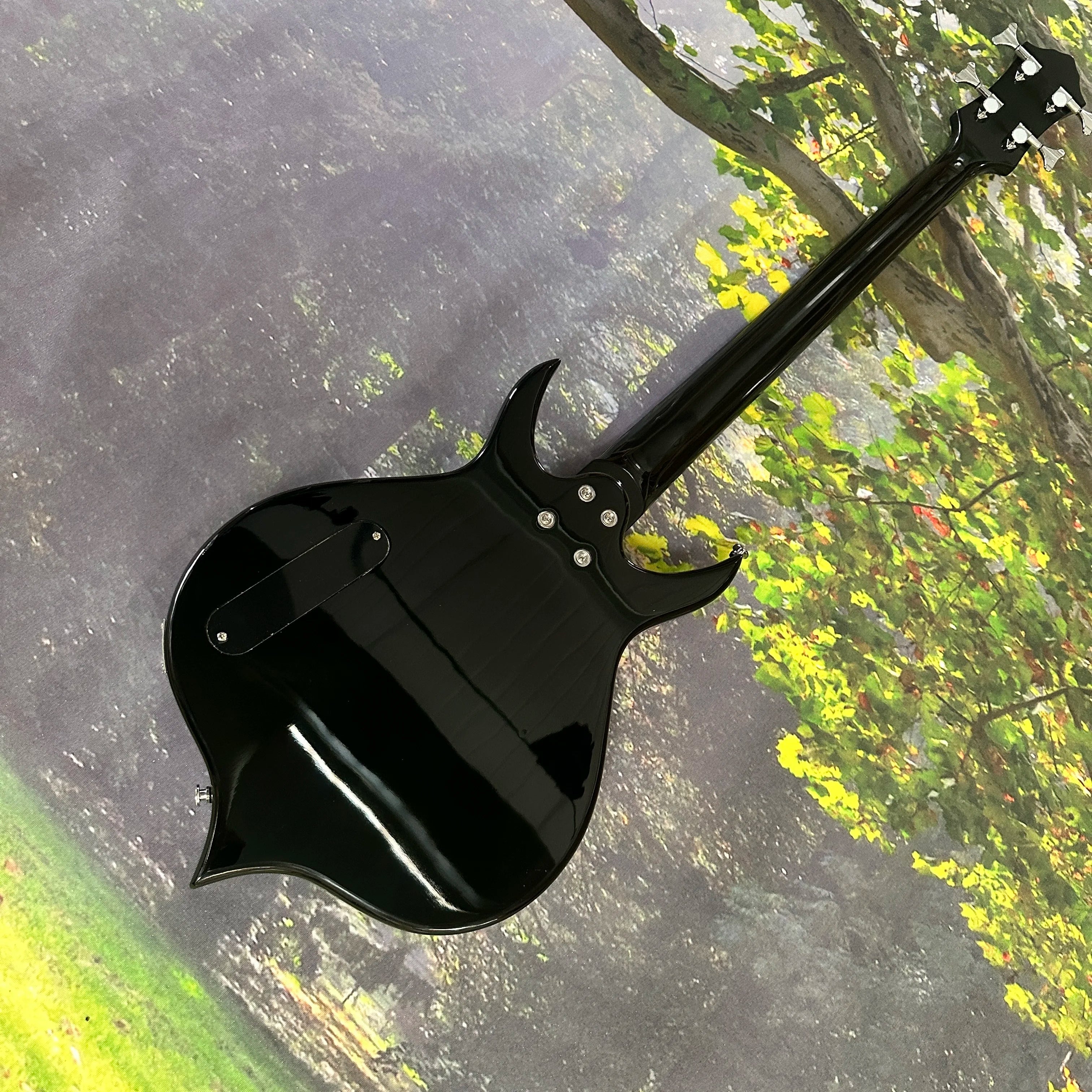 4-string bass guitar in the shape of a peach hardware electric bass guitars black guitarra