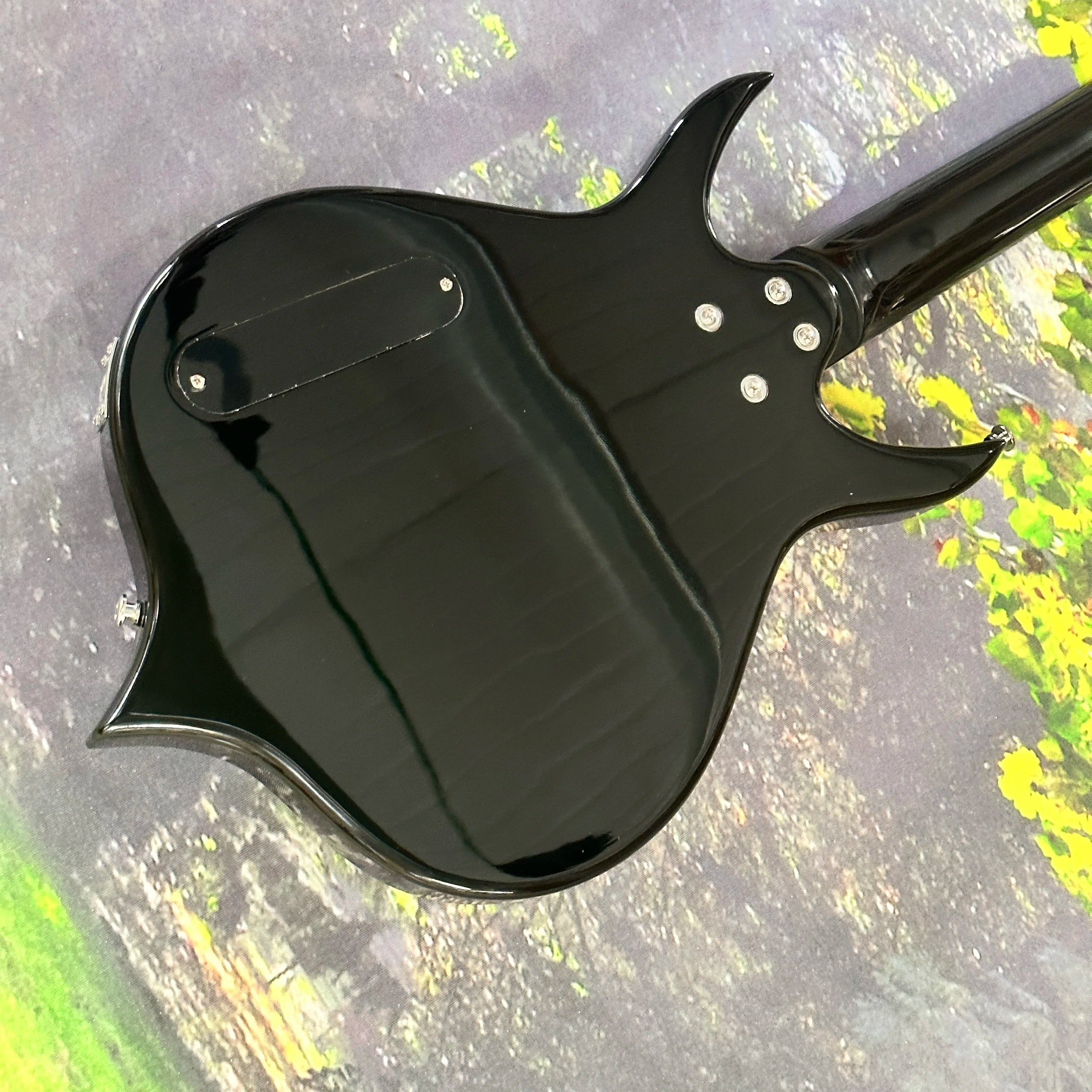 4-string bass guitar in the shape of a peach hardware electric bass guitars black guitarra